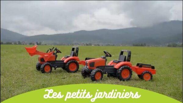 Traktor sa prikolicom Kubota 2065ab na pedale na travi