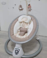 Ležaljka za bebe Twiddle bež boje ovalnog oblika slika uživo
