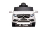 Auto za decu na akumulator Mercedes GL63 AMG LICENCIRANI bele boje sa uključenim led svetlina i prikazan sa prednje strane.