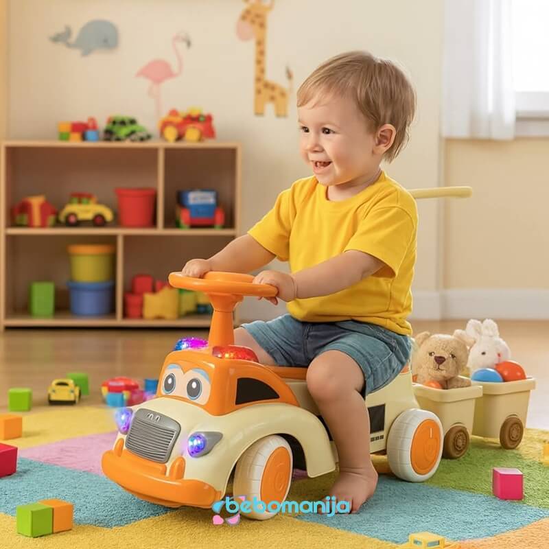 guralica-473-oranz-1 Guralica 473 sa tri prikolice sa detetom kako vozi guralicu