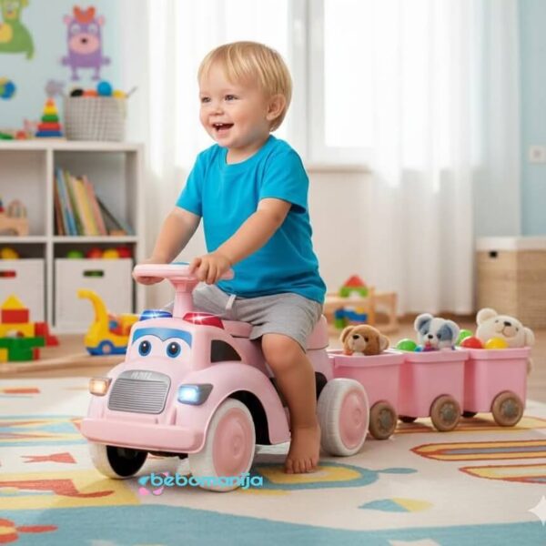 Guralica sa tri prikolice 473 roze sa detetom kako vozi guralicu