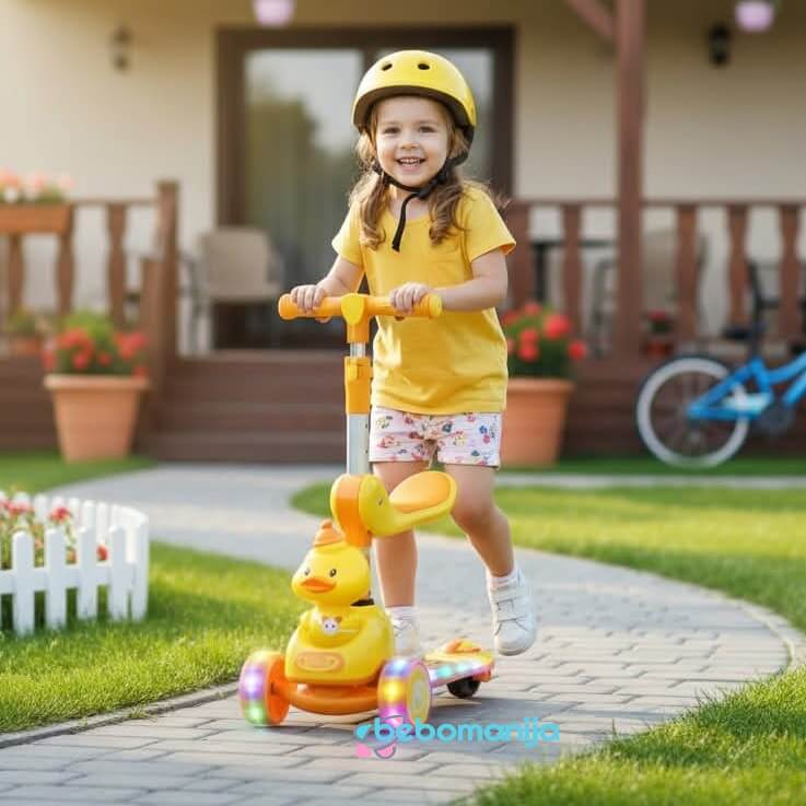 trotinet-za-decu-664-zuti-1 Trotinet sa sedišem Patkica 664 sa devojčicom koja ga vozi