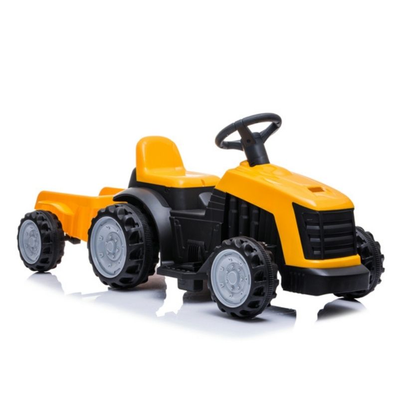 Traktor sa prikolicom na akumulator žuti slikan sa strane