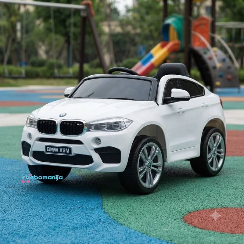 Licencirani BMW X6M na akumulator 12V - Beli BJJ2199 slikan u dečijem igralištu