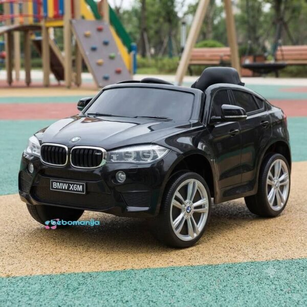 Licencirani BMW X6M na akumulator 12V - Crni BJJ2199 slikan na dečijem igralištu